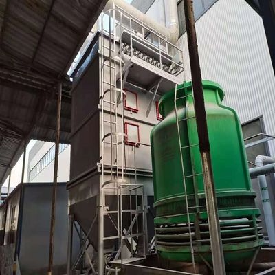 800 kg schwerer Staubsauger auf einem großen Silo in einem Zementwerk